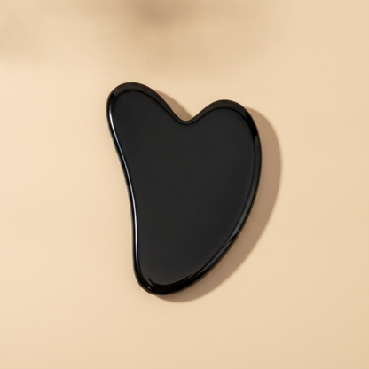 Gua sha viso nero in ossidiana per il massaggio facciale Nuvia
