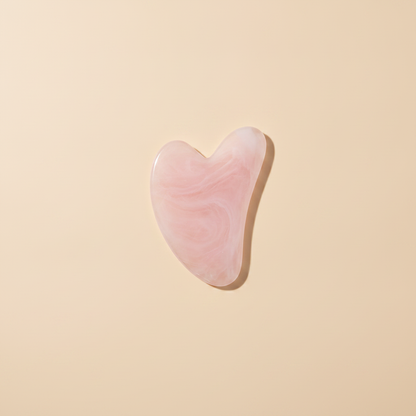 Gua sha viso rosa in quarzo rosa per il massaggio facciale Nuvia