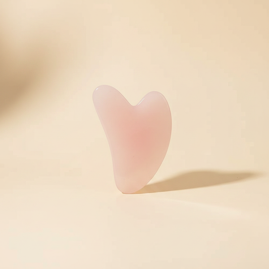 Gua sha viso in quarzo rosa per il massaggio facciale Nuvia